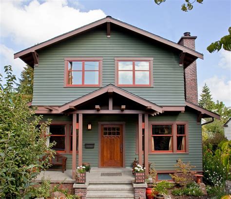 green house with brown metal roof|green house with brown accents.